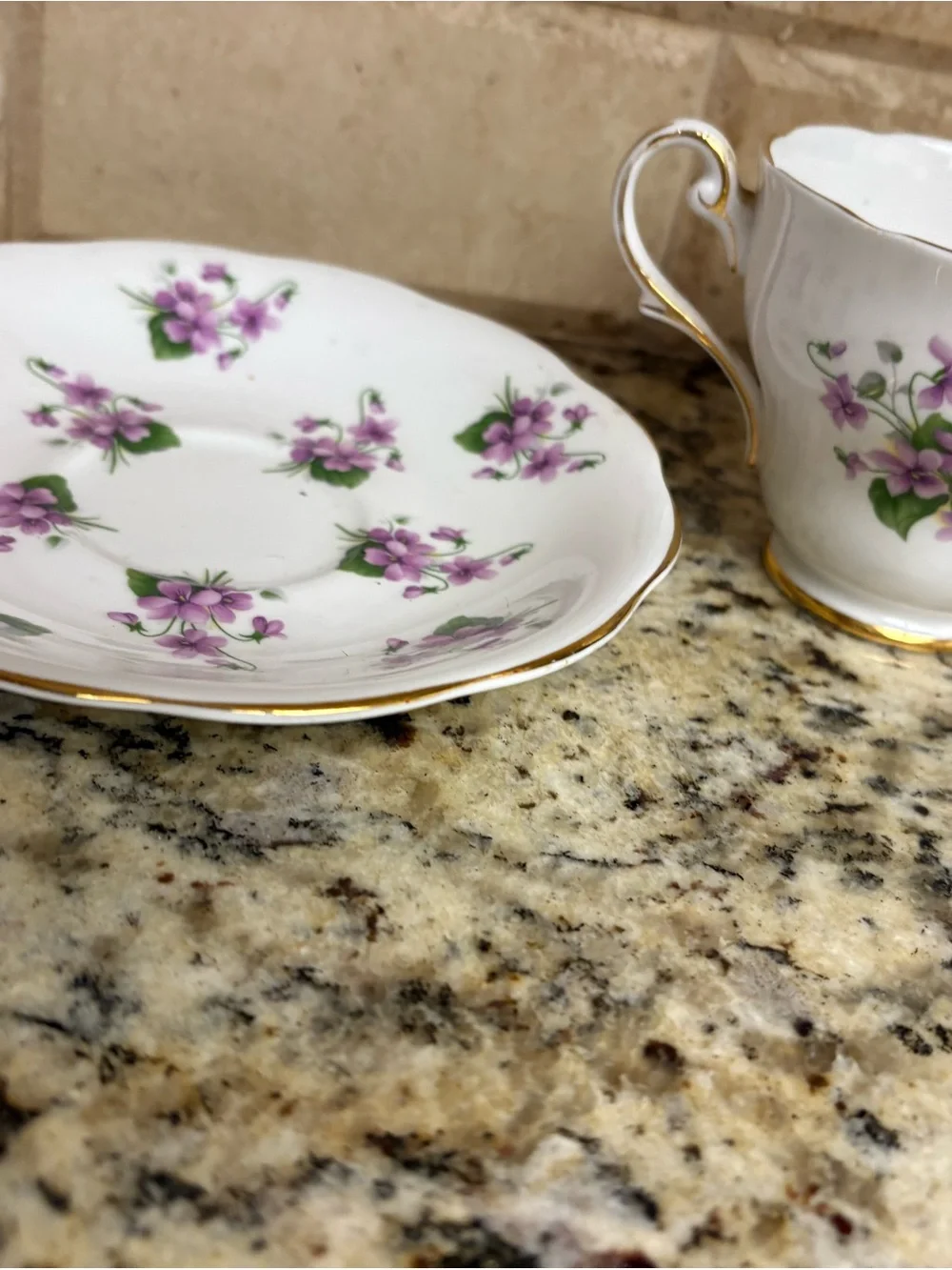 White Teacup & Saucer with Purple Floral Pattern and Gold Trim